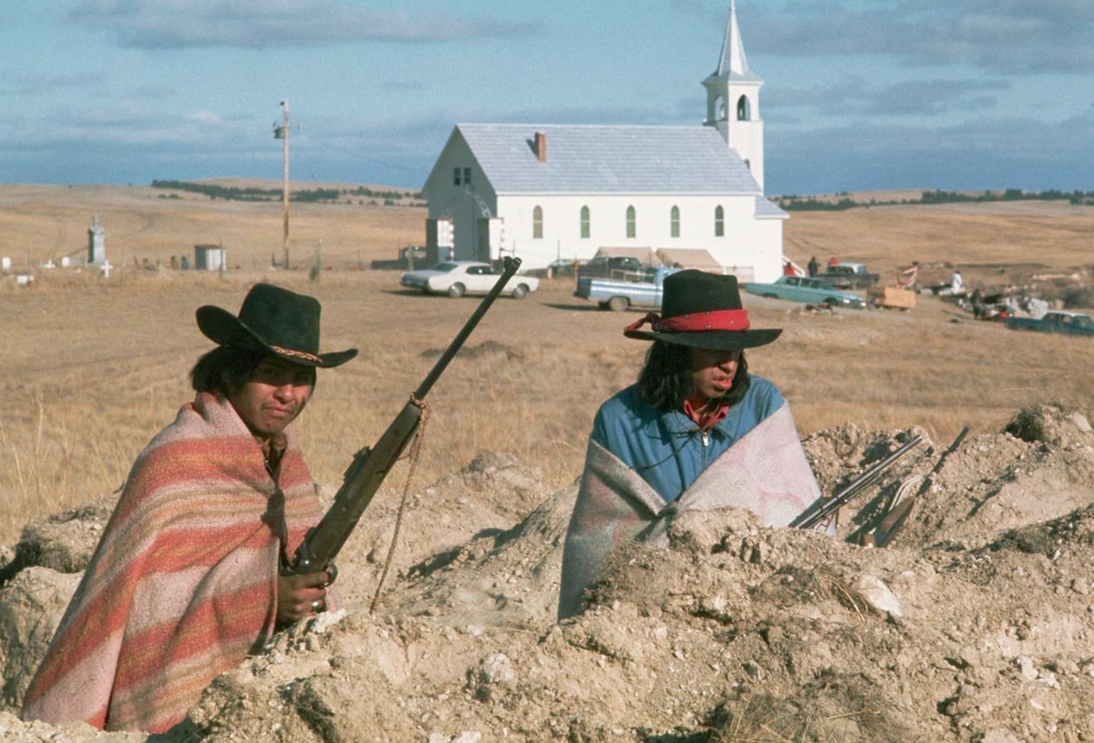 “American Indian Movement (AIM) activists at the 71-day occupation of Wounded Knee on South Dakota’s Pine Ridge Reservation on March 7, 1973.”